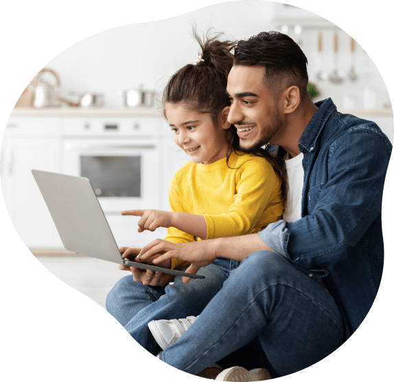 parent and child on laptop