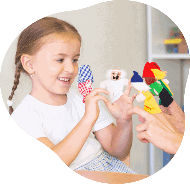 SENtre Therapies child playing with finger puppets