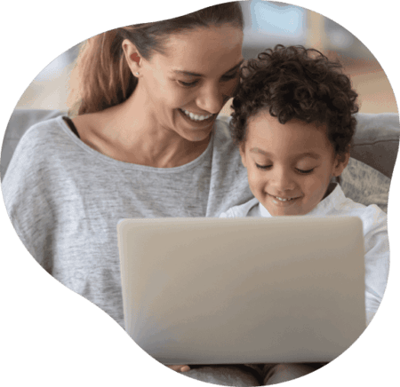 parent and child on a laptop learning