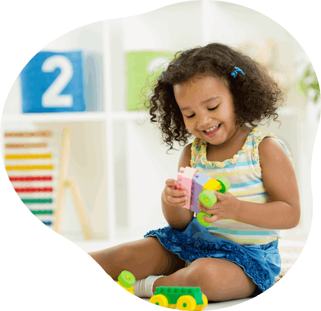 child playing with lego building blocks